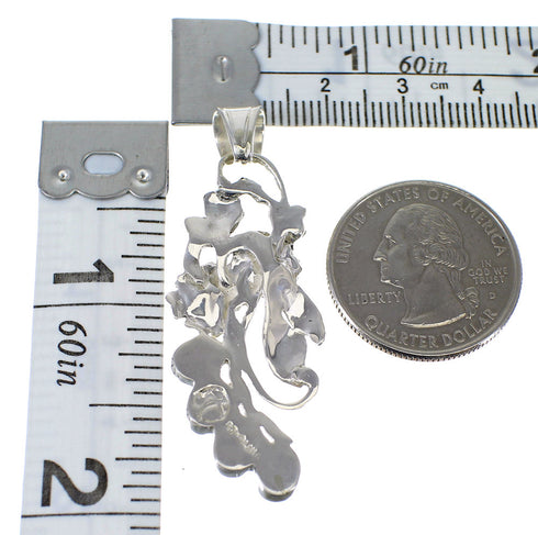 Sterling Silver And Magenta Turquoise Flower Pendant AX49598