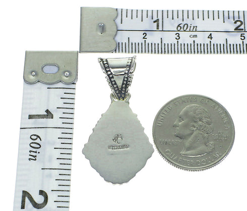 Genuine Sterling Silver And Magenta Turquoise Southwestern Pendant WX66794